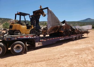 Destroyed trailer on flatbed